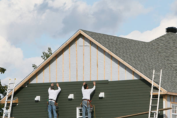 Professional Siding technician working in Carrboro, NC